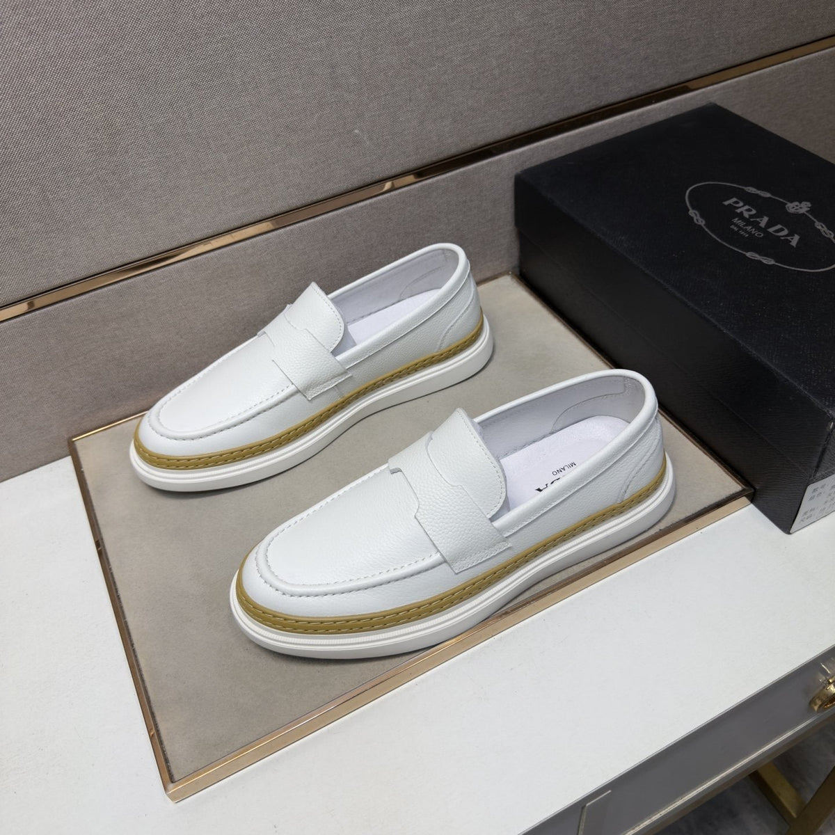 Prada Gold Accent Slip-On Loafers